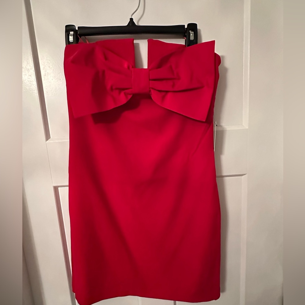 Red strapless bow mini dress